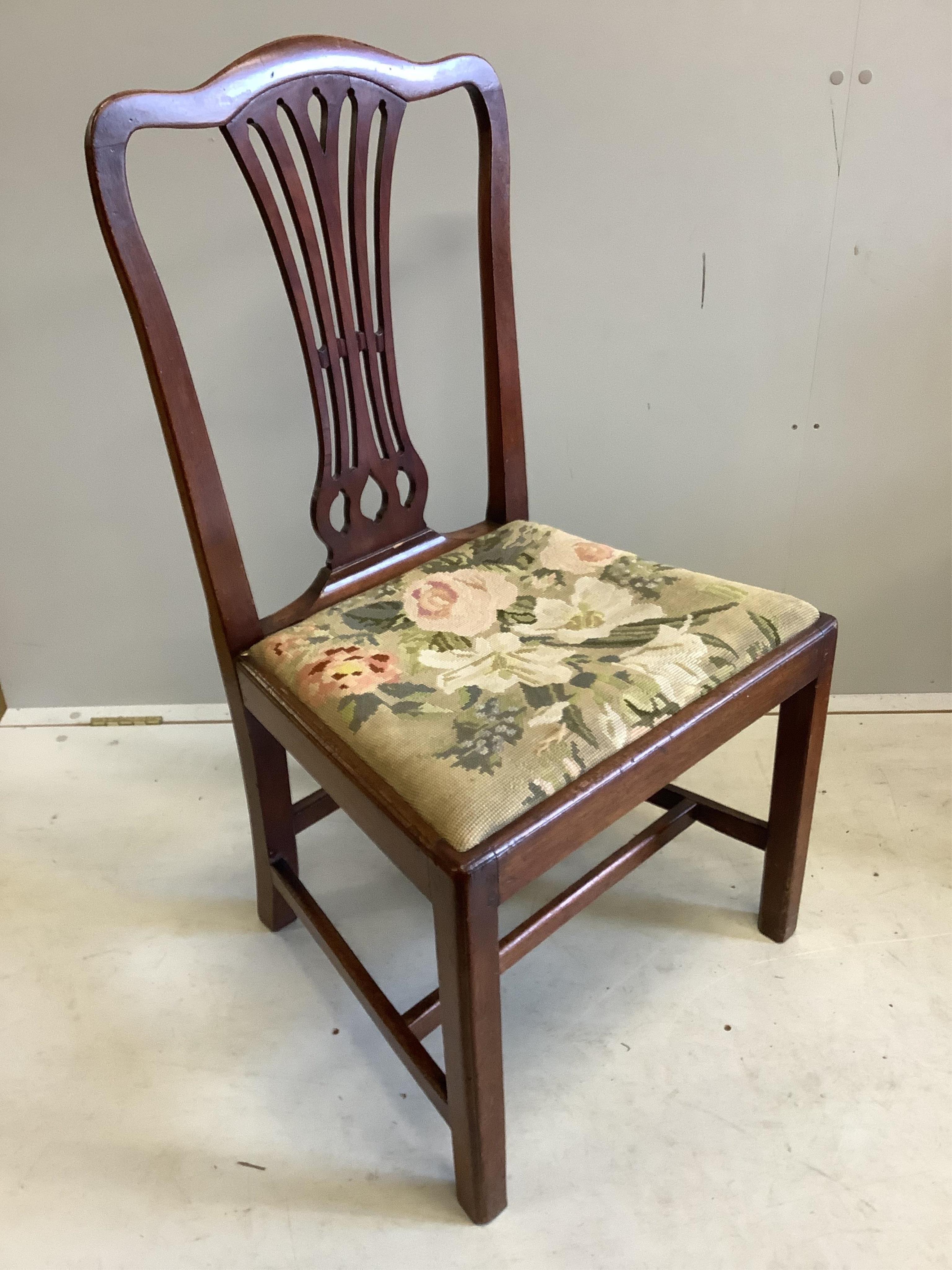 A pair of Victorian mahogany dining chairs, on fluted legs, another on cabriole legs and a Chippendale style chair, with a drop in tapestry seat. Condition - fair